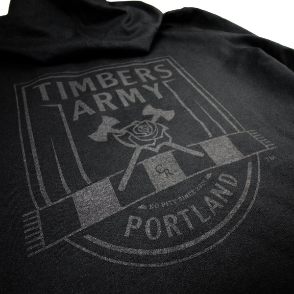 Detail of black on black Timbers Army Crest design on the back of the hoodie.