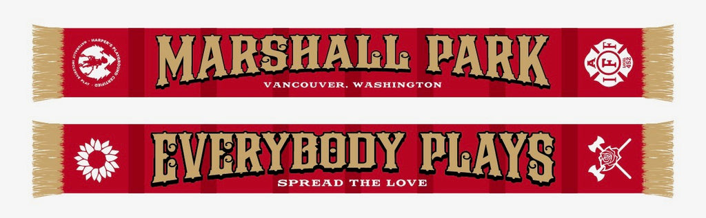 Bold red scarf, with darker red stripes on both sides, and deep gold fringe and letters.  One side says "MARSHALL PARK, Vancouver Washington" and the other says "EVERYBODY PLAYS, Spread the Love". The 4 designs on the end of the scarf are the Timbers Army Axe and Rose, the Harper's Playground flower, and the IAFF Local 452 Vancouver Firefighters crest.
